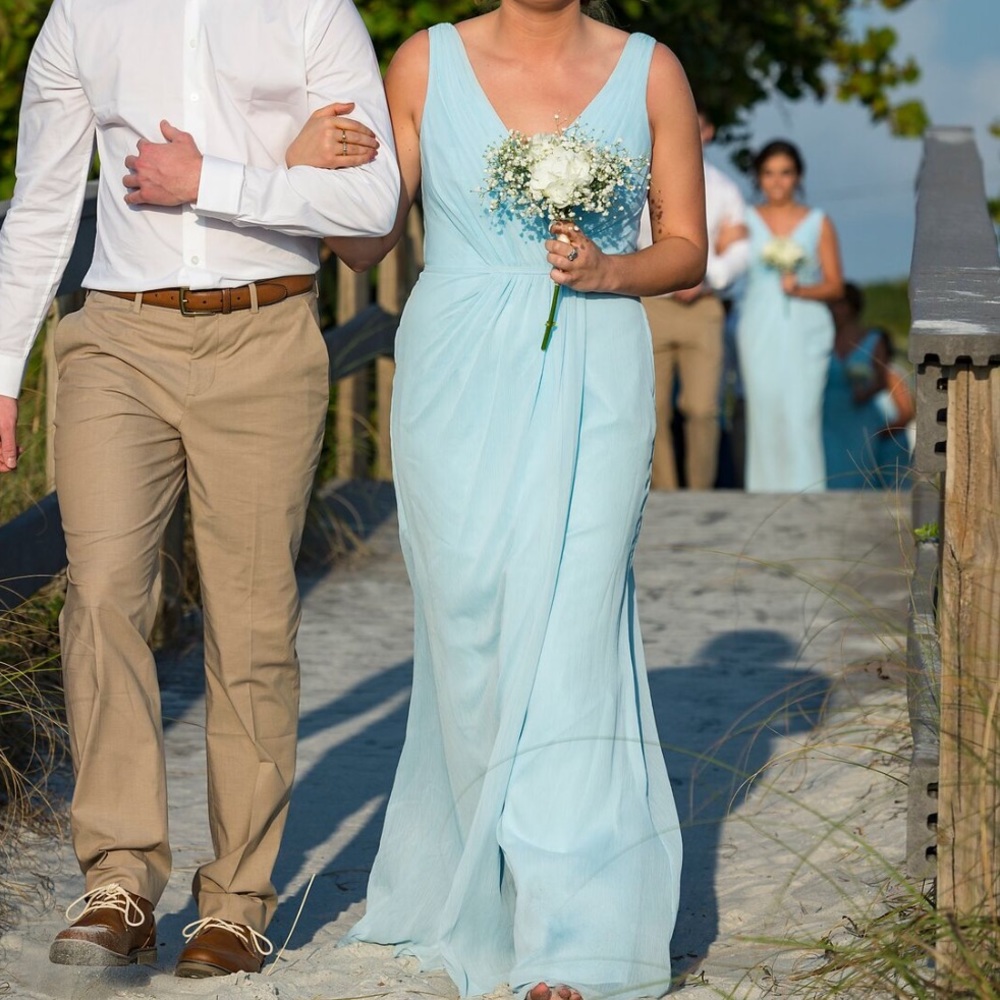 Baby blue floor length bridesmaid dress.